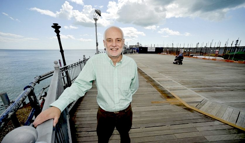 Councillor David Tutt on Eastbourne's pier after the fire