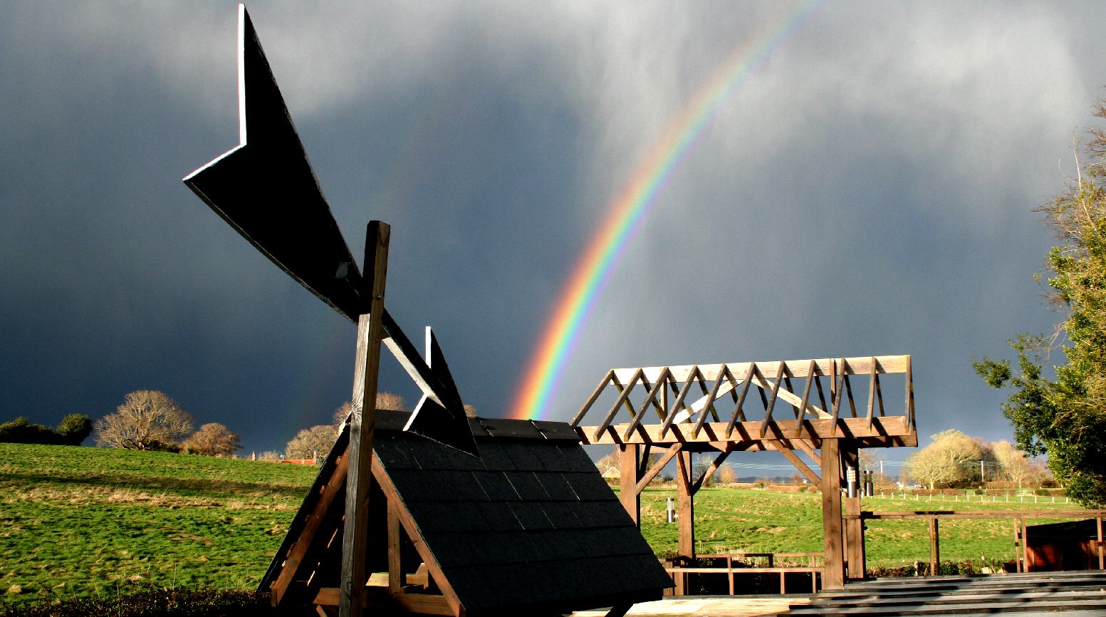 A rainbow over the well supplying drining water to Solar House
