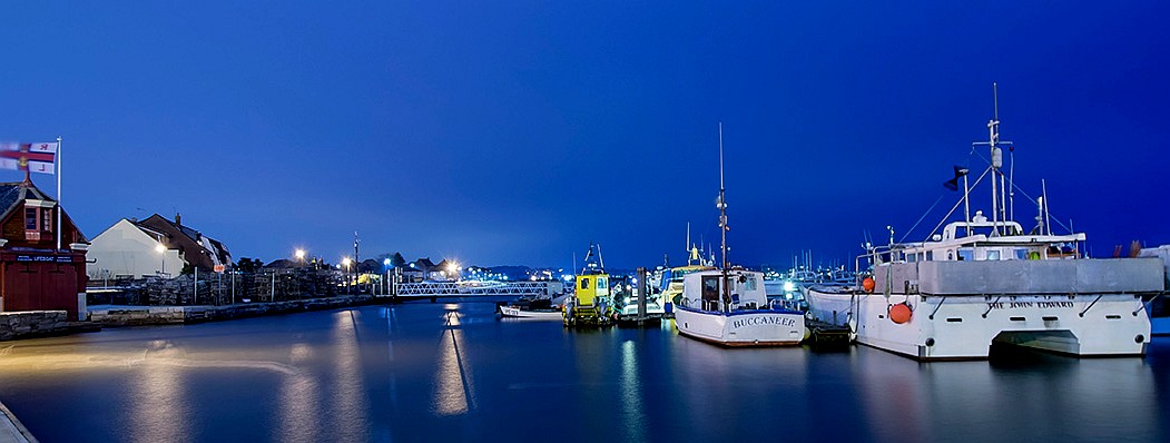 Poole harbour, RNLI building and marina with boats